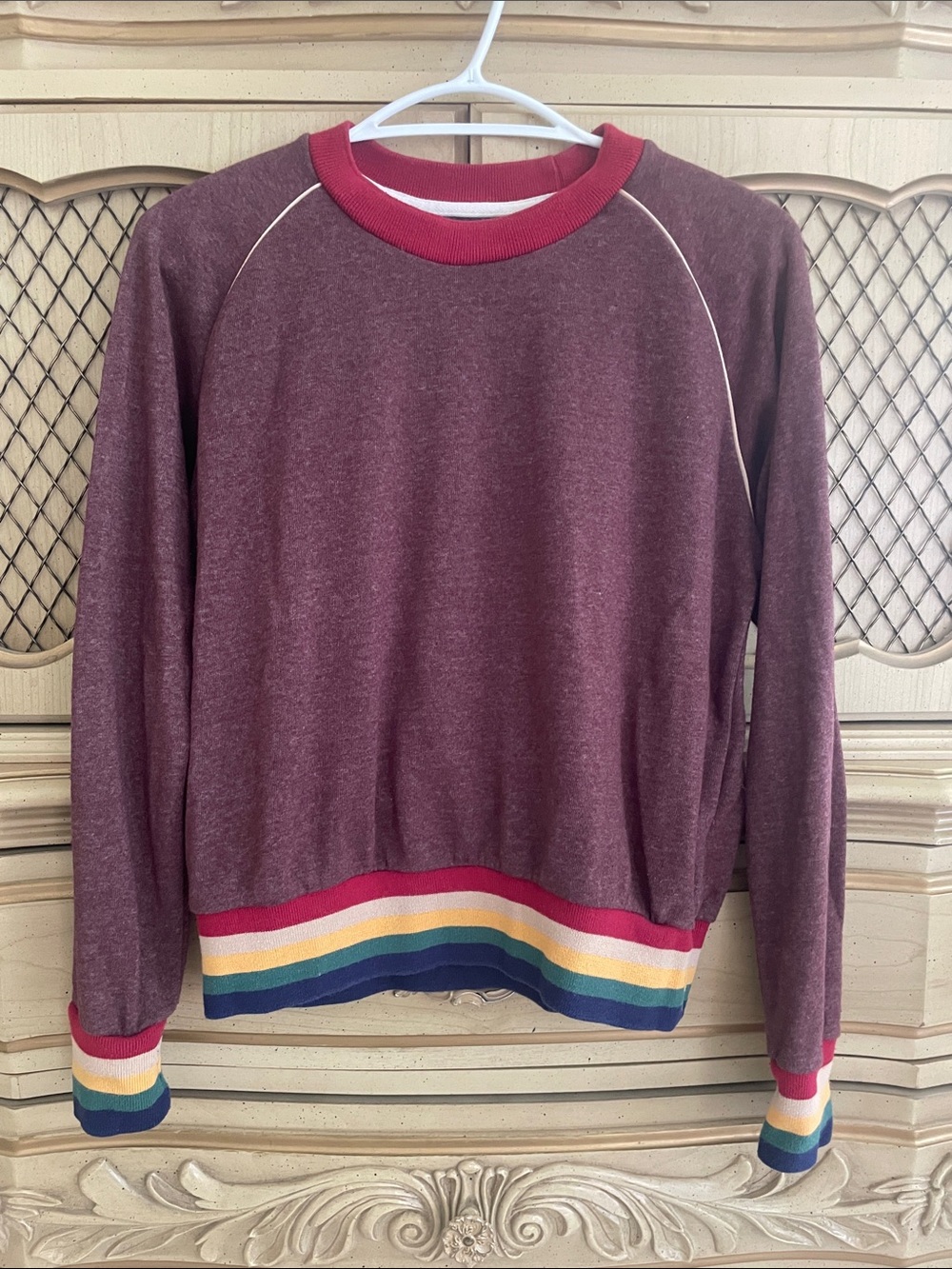 Women’s Burgundy Crewneck Sweatshirt with Rainbow Stripe Hem